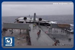 عبور ناوشکن دنا از آب‌های خروشان اقیانوس آرام + فیلم