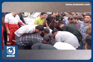 لحظه خارج شدن پیکر شهدای حادثه ریزش ساختمان در تهران + فیلم