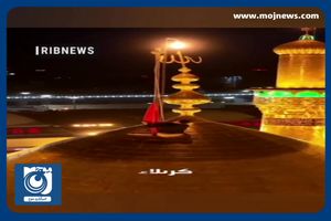 برافراشته شدن پرچم سرخ شهادت بر فراز گنبد حرم سیدالشهدا + فیلم